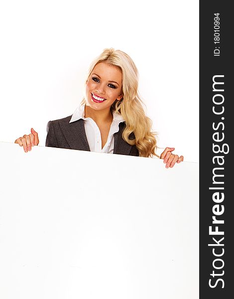 Portrait of a beautiful sexy blonde happy business woman holding a blank billboard. Ready to add text. Portrait of a beautiful sexy blonde happy business woman holding a blank billboard. Ready to add text.