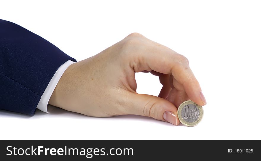 Woman's hand and the coin of 1 euro