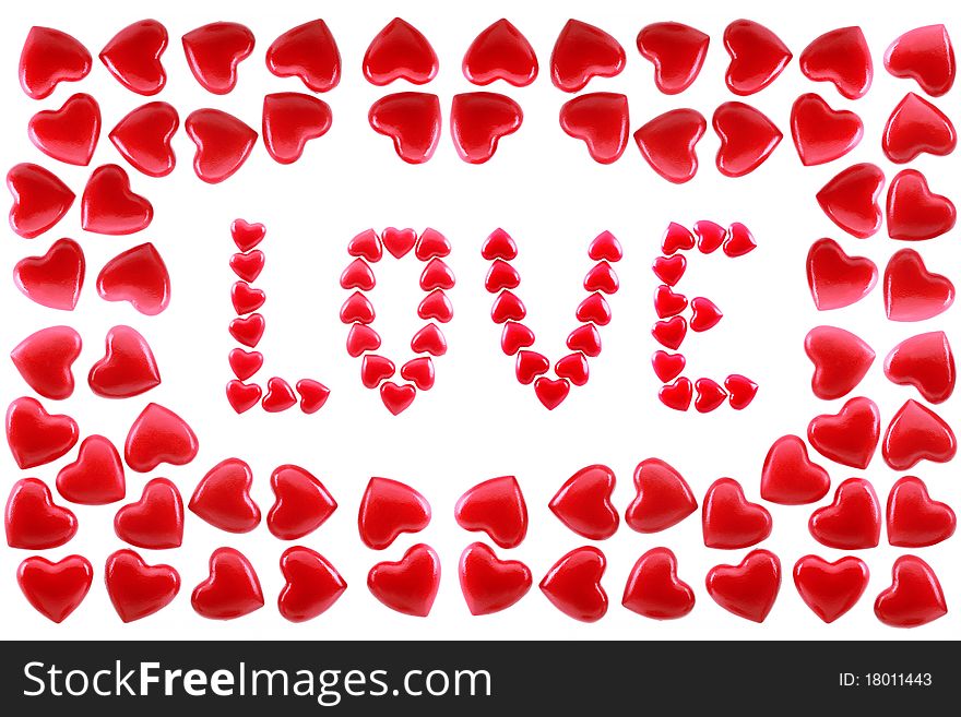 Word love in a framework from red hearts are isolated on a white background