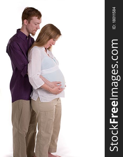 A young couple expecting the arrival of their first child. A young couple expecting the arrival of their first child.