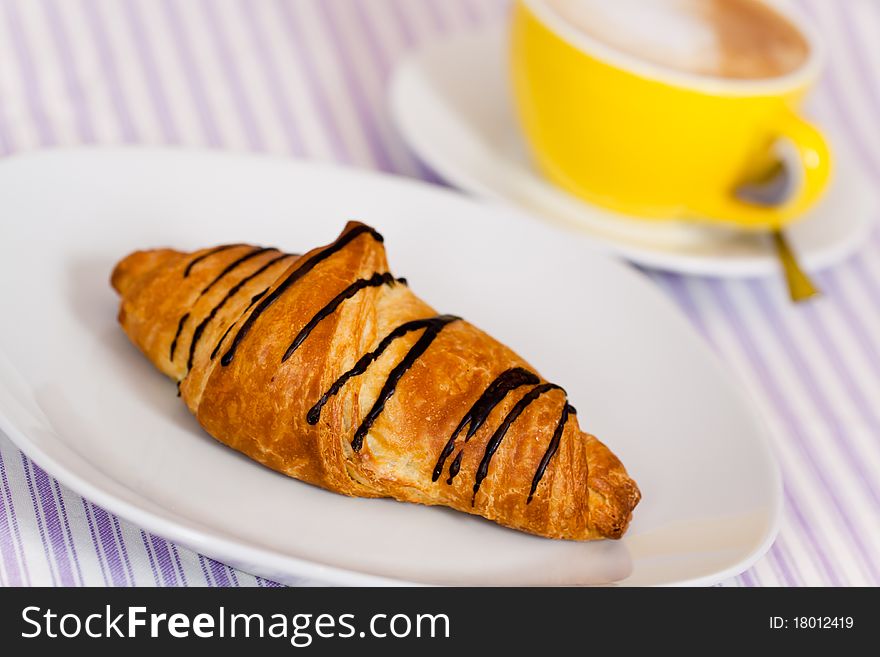 Hot drink,cappuccino and chocolate croissant , isolated on white,. Hot drink,cappuccino and chocolate croissant , isolated on white,