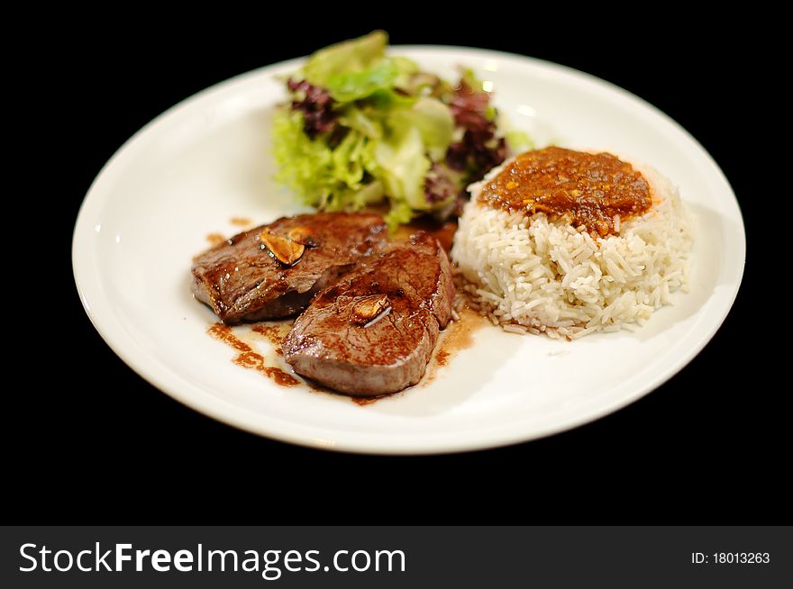 Steak Meal With Rice And Salad