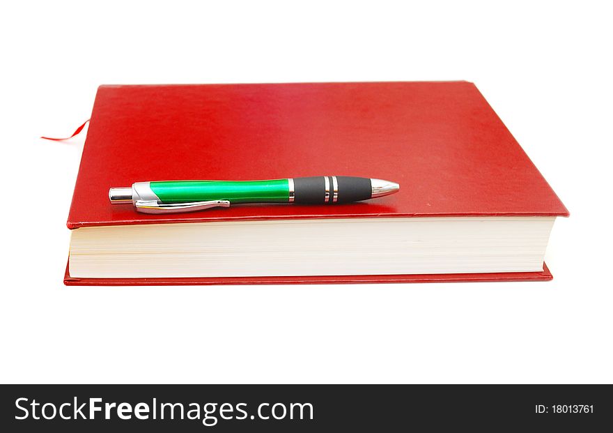 Book with green pen background