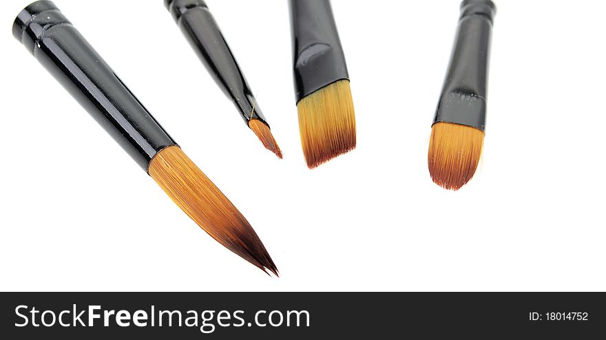 Painter tools with some brushes   isolated on the white background. Painter tools with some brushes   isolated on the white background.