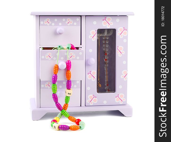 Fun purple children Jewelery box with necklaces on white background.