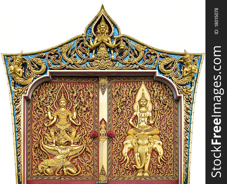 Temple door decorated on wood carved gold paint ,thai style in temple at Bangkok, Thailand. Temple door decorated on wood carved gold paint ,thai style in temple at Bangkok, Thailand