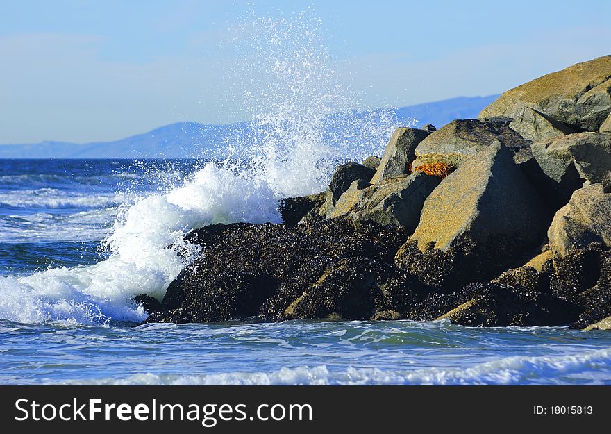 Waves crushing into the rocks