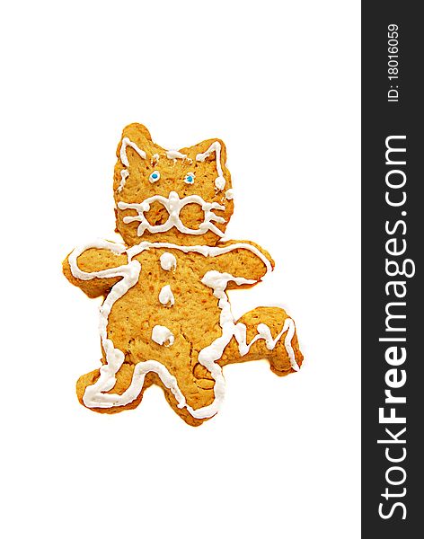 Baked cookies in the form of a cat on a white background