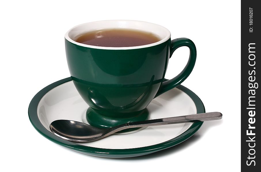 Cup of tea and spoon isolated on white background