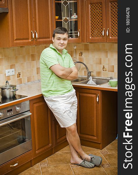 A Young Attractive Man In The Kitchen