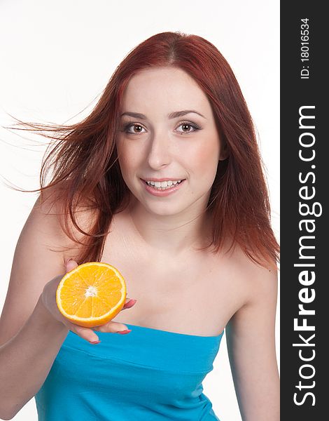 A redhead woman with an orange