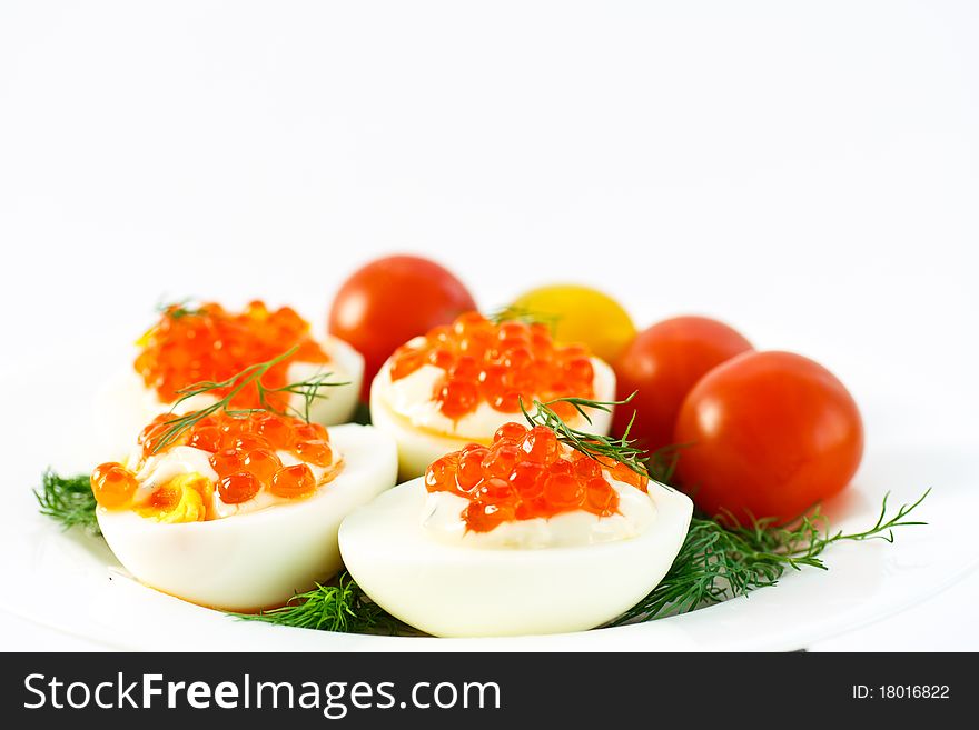 Eggs with caviar and dill tomatoes. Eggs with caviar and dill tomatoes