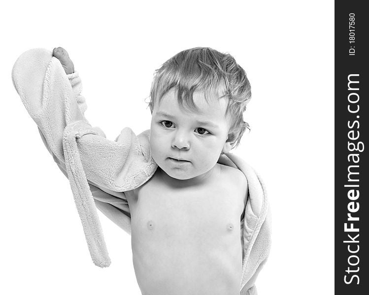 Baby in bathrobe on white