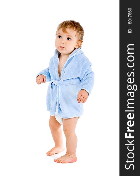 Baby in blue bathrobe on white