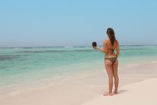 Beautiful Woman In A Tropical Beach Stock Photo