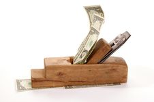 Work And Earn. Old Wood The Planer And Banknotes Royalty Free Stock Photography Work And Earn. Old Wood The Planer And Banknotes Royalty Free Stock Photography