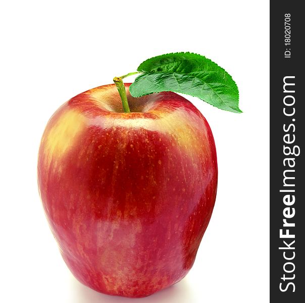 Red fresh apple with green leaf
