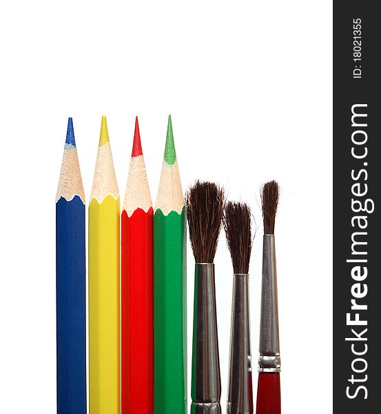 Paintbrushes and color pencils