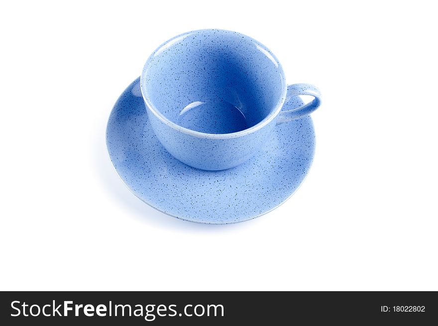 Blue cup with saucer isolated on white background