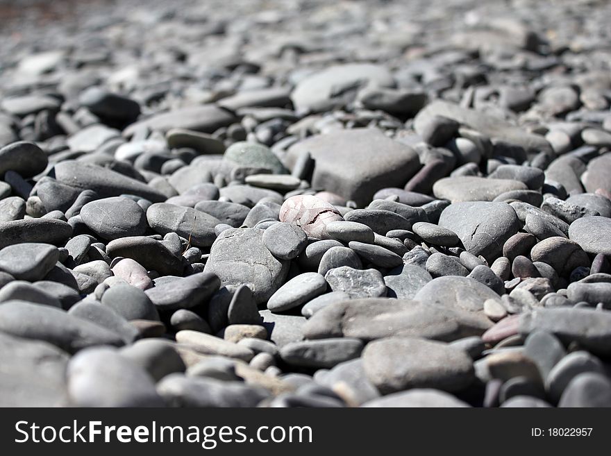 Mound of dry pebbles on the beach