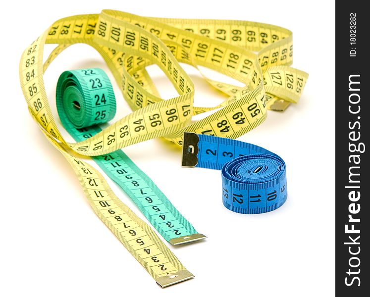 Three measuring tapes isolated over white background. Three measuring tapes isolated over white background