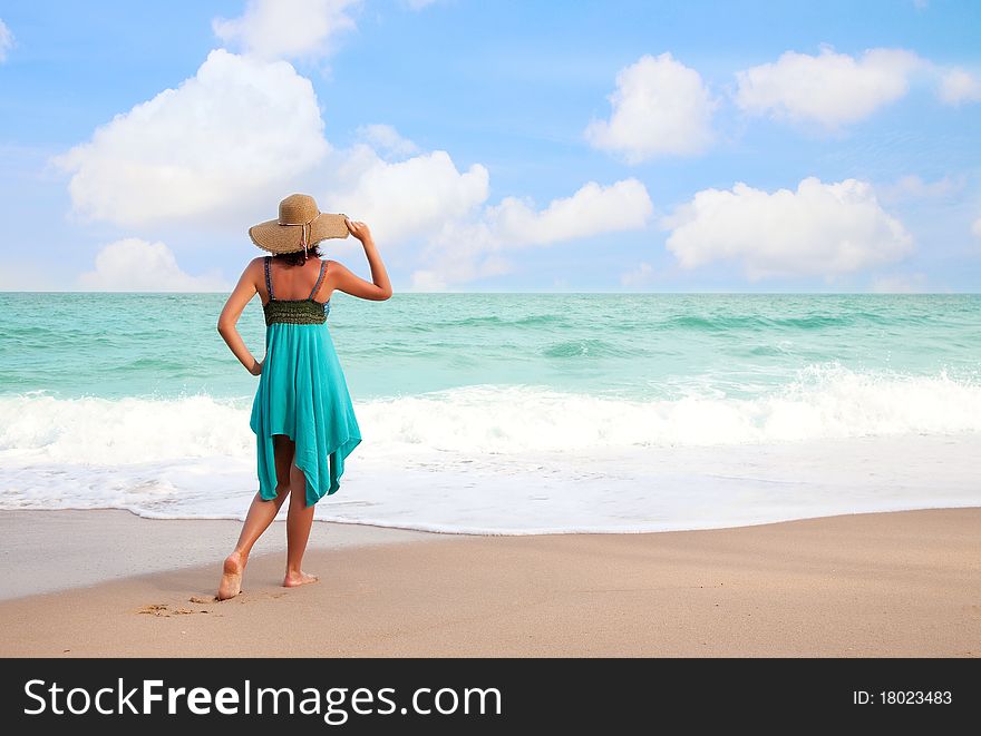 Beautiful  Woman On The Beach