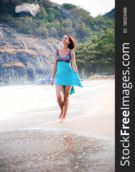 Beautiful beach in the Thailand, with a woman on the beach