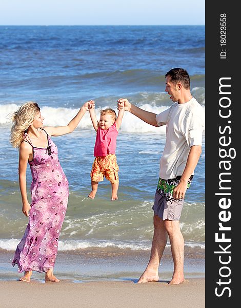 Family on the shore of the sea. Family on the shore of the sea