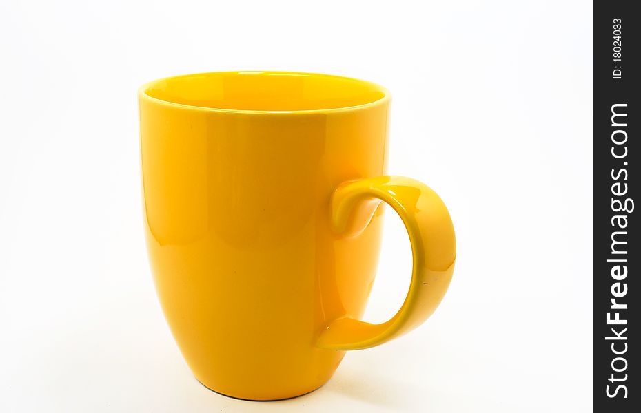 Yellow coffee cup isolated on white background. Yellow coffee cup isolated on white background