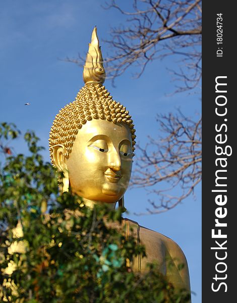 Big golden buddha with blue sky, Ang Thong province, Thailand. Big golden buddha with blue sky, Ang Thong province, Thailand.