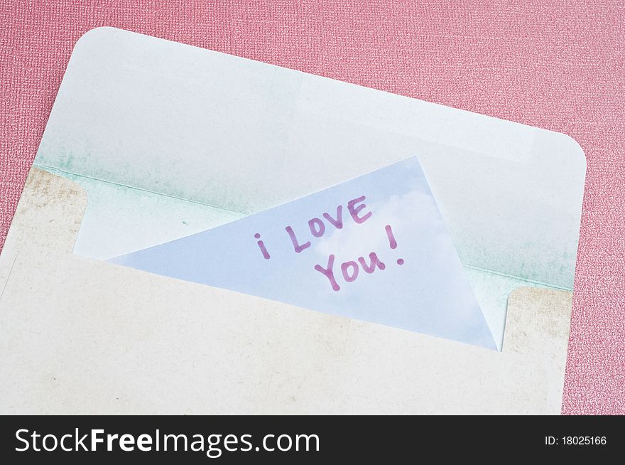 I Love You Concept with Handwritten Note in an Envelope.