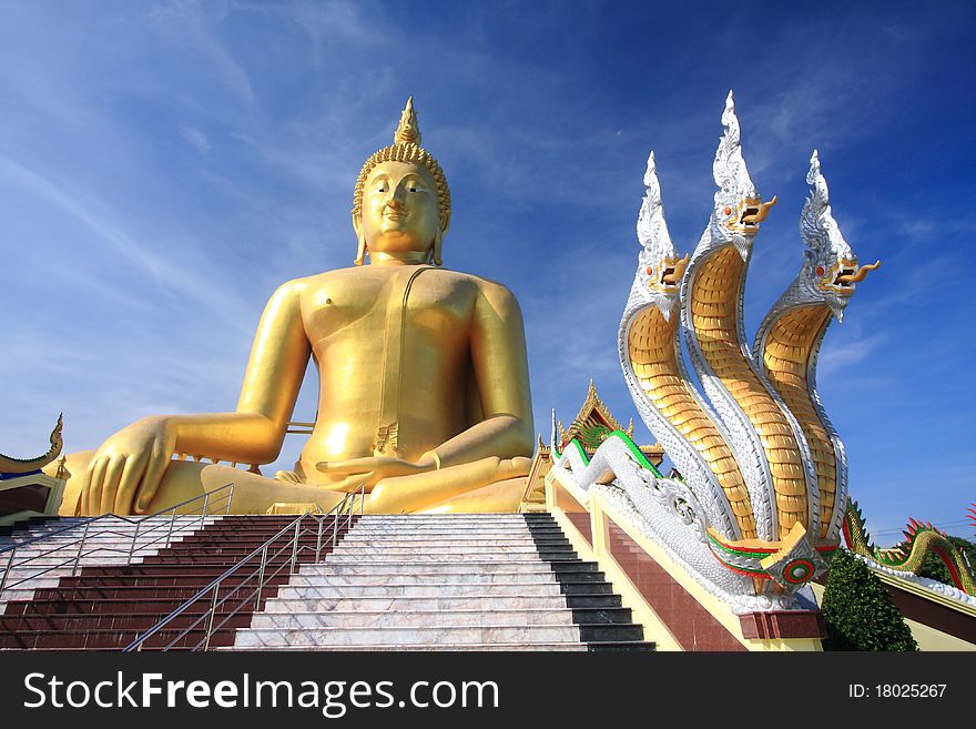 Big golden buddha with blue sky, Ang Thong province, Thailand. Big golden buddha with blue sky, Ang Thong province, Thailand.