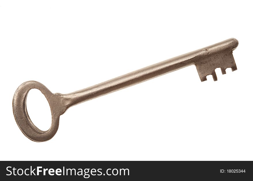 Metallic large door key isolated on white background