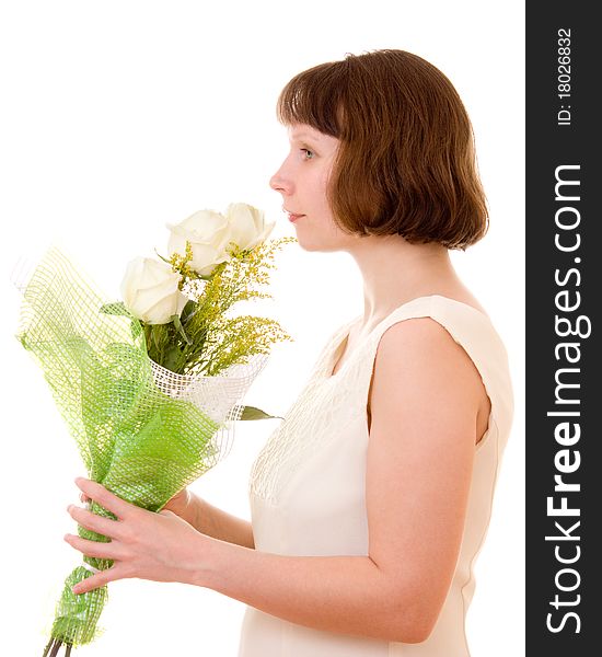 Girl with a bouquet of white roses.
