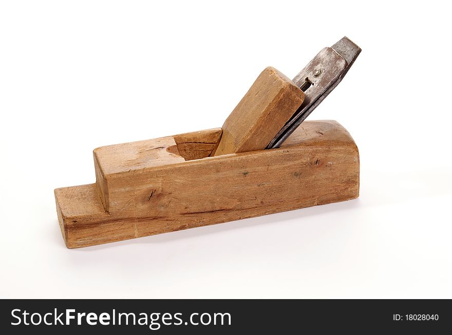 Old wooden planer close-up, white background