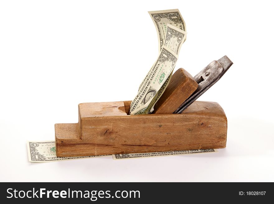 Work and earn. Old wood the planer and paper banknotes on a white background. Work and earn. Old wood the planer and paper banknotes on a white background