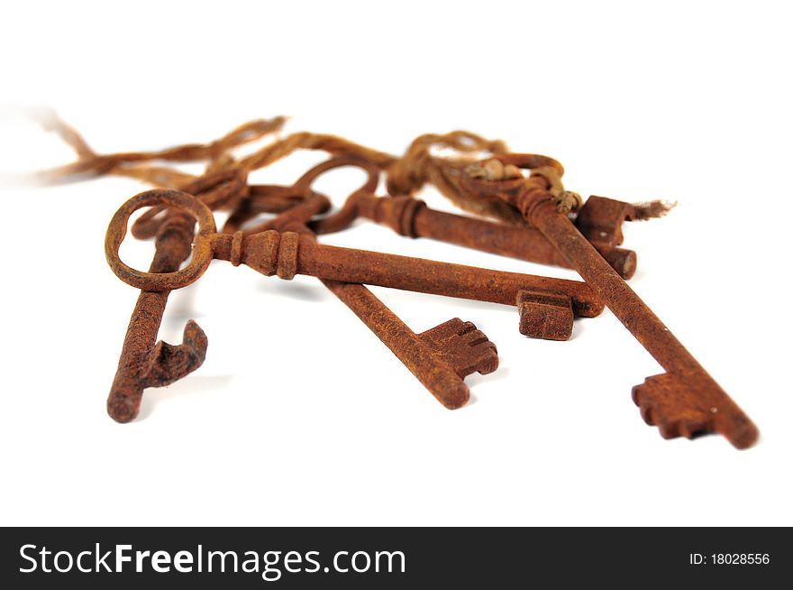 It photographs of first plane of group of old and rusty keys. It photographs of first plane of group of old and rusty keys