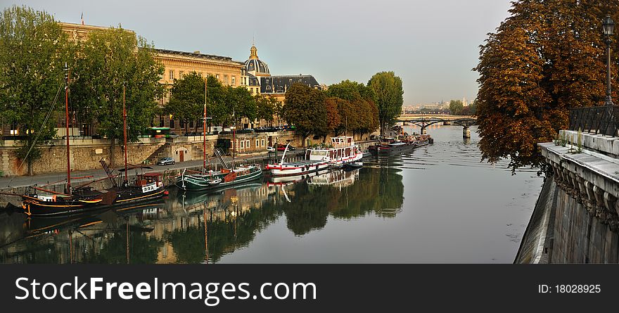 View of Seine riverside, early morning, Institute de France and Pont des Arts from Pont Neuf, Paris