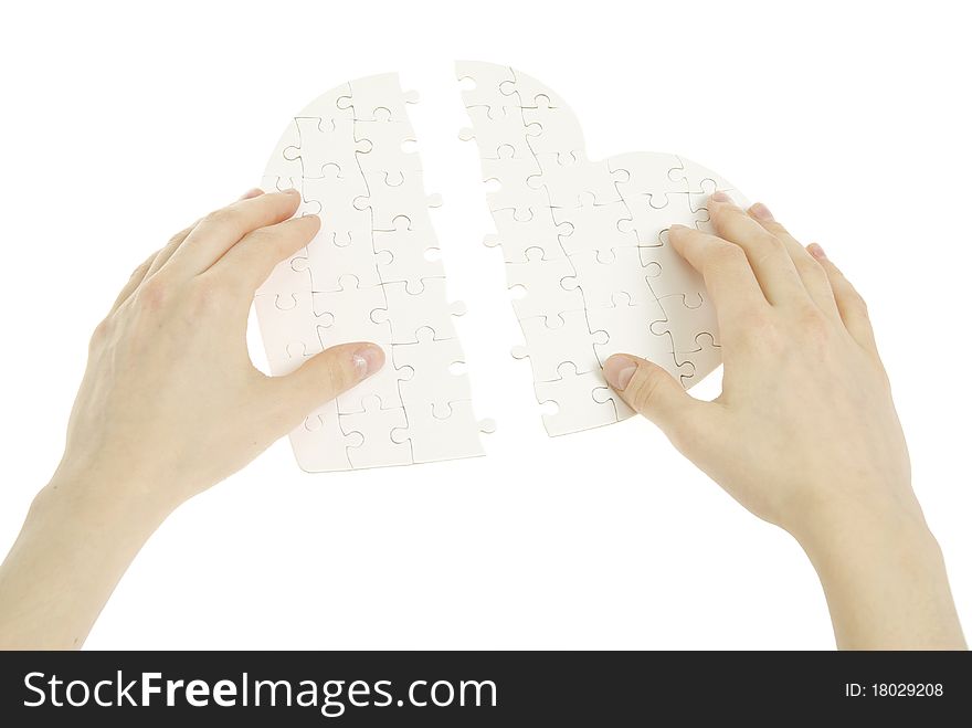 Puzzle heart isolated on a white background