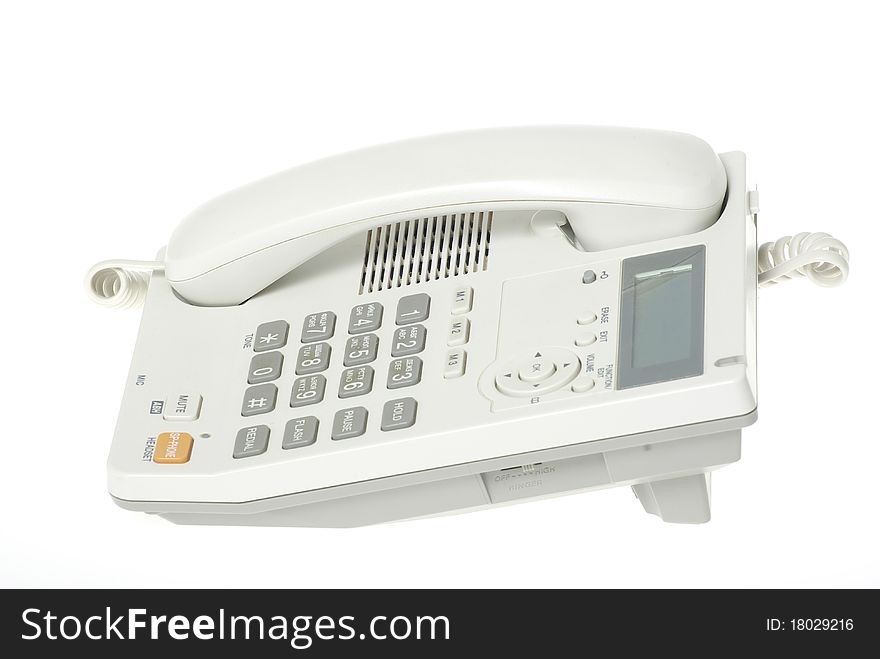 White office telephone on a white background. White office telephone on a white background