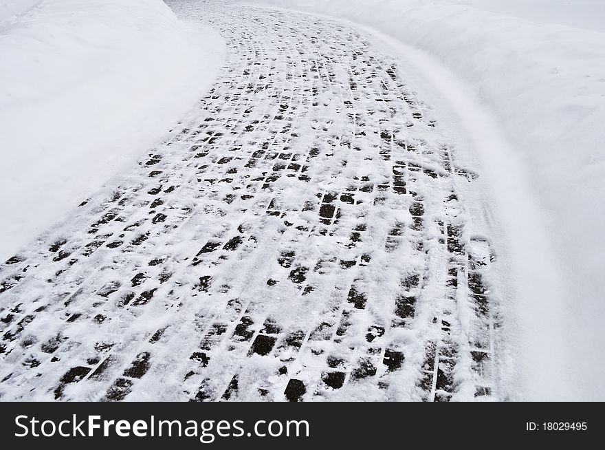 Snow covered pavement background