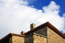 Old Stone House Against The Blue Sky With Clouds Royalty Free Stock Photo Old Stone House Against The Blue Sky With Clouds Royalty Free Stock Photo