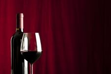 A Glass Of Red Wine And A Bottle Stock Image A Glass Of Red Wine And A Bottle Stock Image
