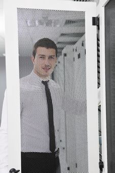 Young It Engeneer In Datacenter Server Room Stock Image Young It Engeneer In Datacenter Server Room Stock Image