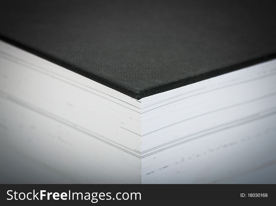 Extreme close-up of a thick book - selective focus. Extreme close-up of a thick book - selective focus