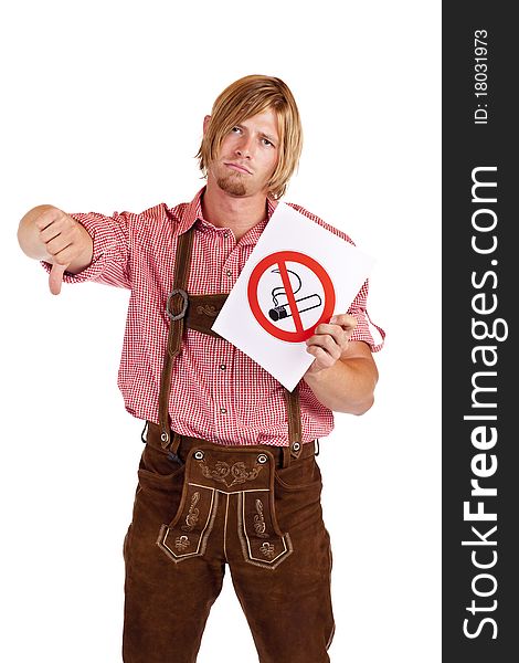 Disapointed Bavarian man in lederhose disagrees to non-smoking-rule. Isolated on white background. Disapointed Bavarian man in lederhose disagrees to non-smoking-rule. Isolated on white background.