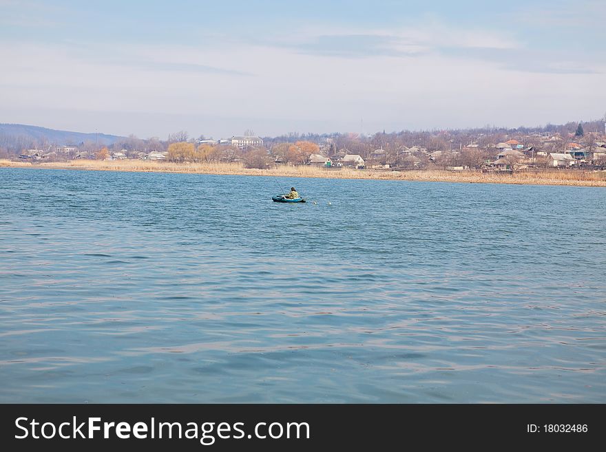 Fishing from boat on thr river