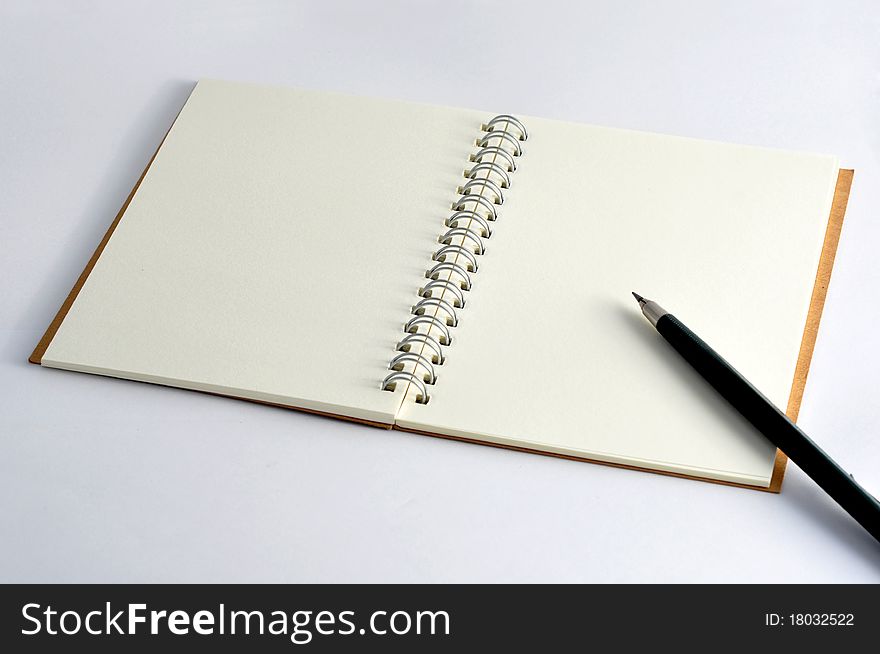 Blank notebook with pencil, You can write anything on it.