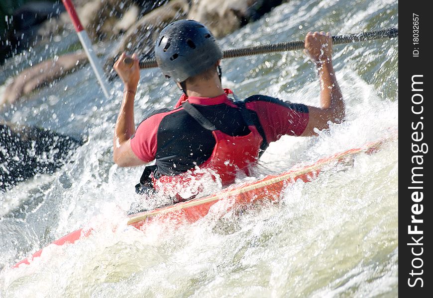 An active kayaker on the rough water