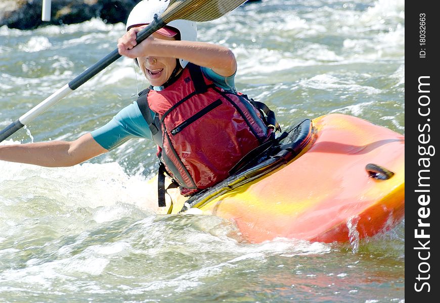 An active kayaker on the rough water